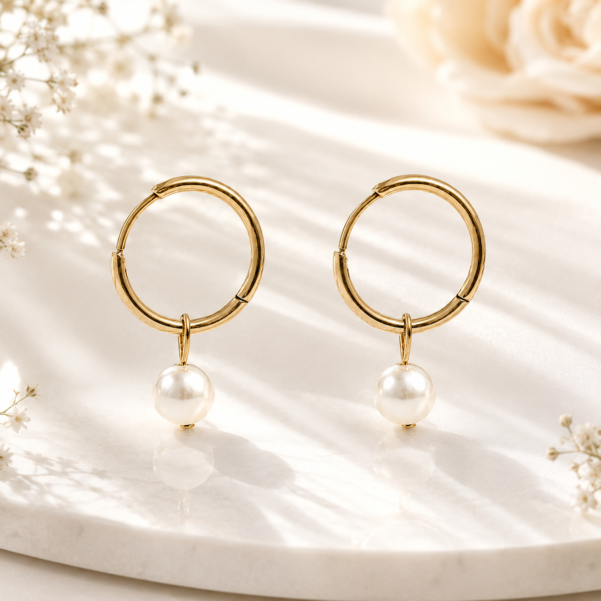 Pearl Huggie Hoop Earrings – product image 1
