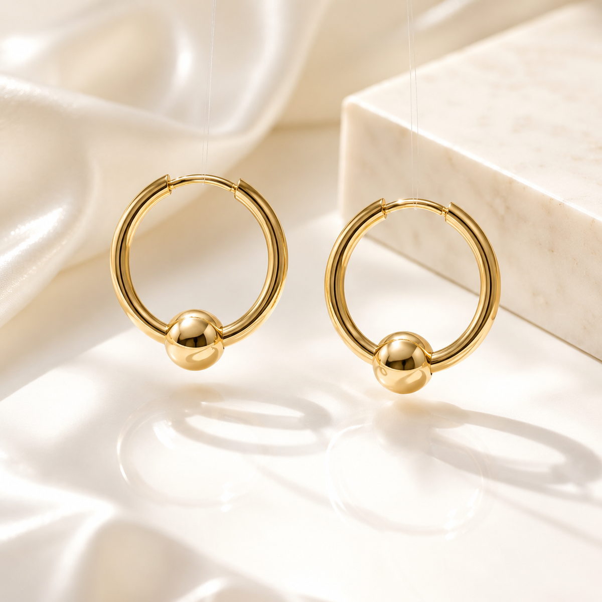 Ball Huggie Hoop Earrings – product image 1